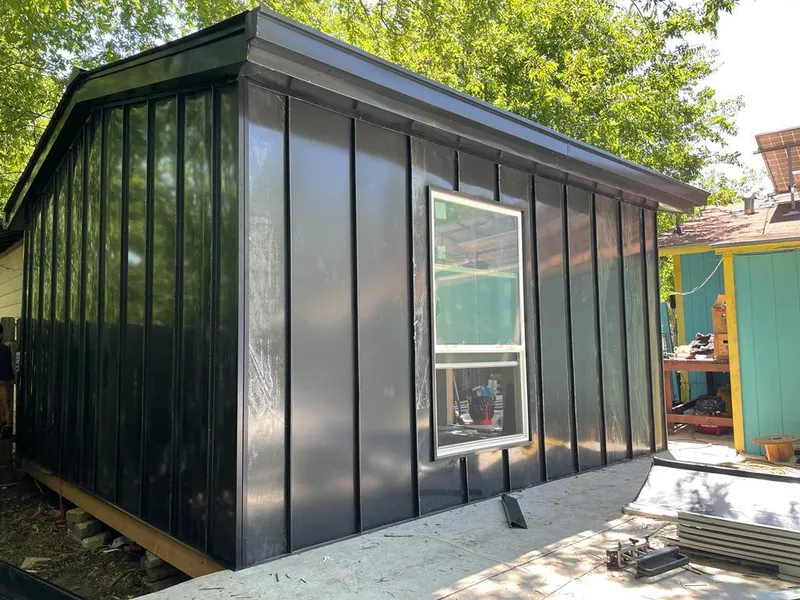 Black standing seam metal wall panels for Roof Inspection in Pelham